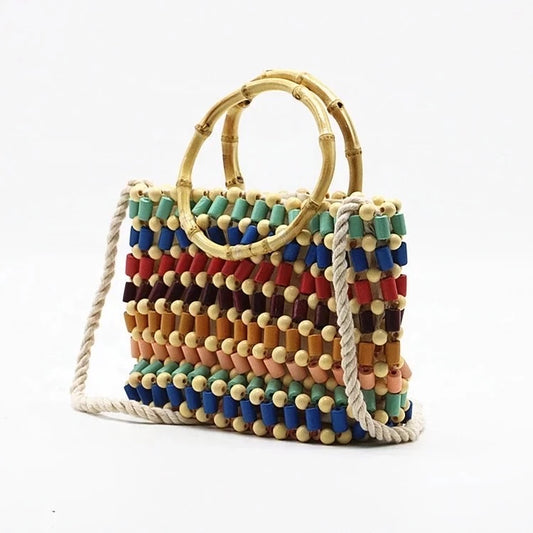 beaded handbag with bamboo handles perfect for beach or light weight travels.